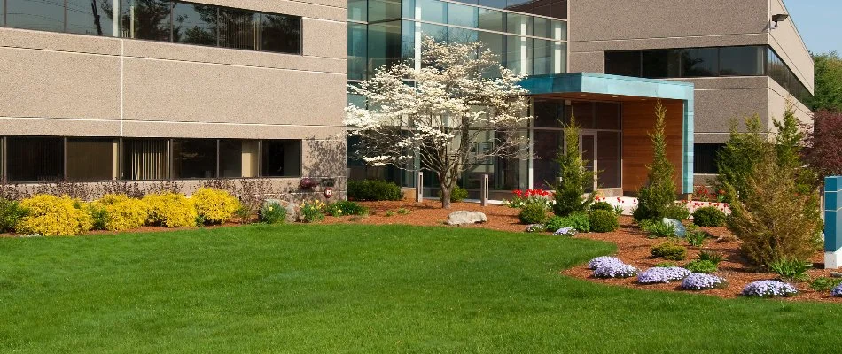 A commercial property in Lititz, PA, with landscape beds filled with plants.