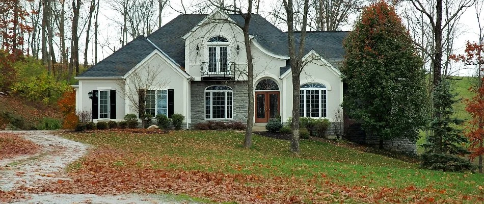 Home with fall leaves on front lawn in Lititz, PA.