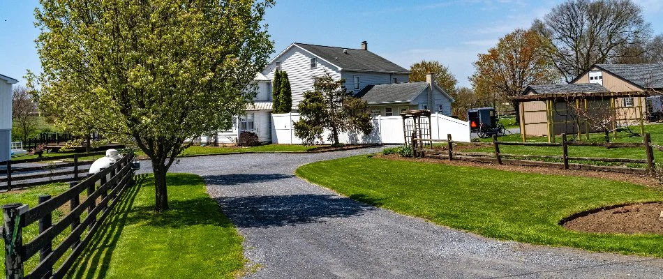 A property in Lancaster, PA, with a neat lawn and landscape beds.