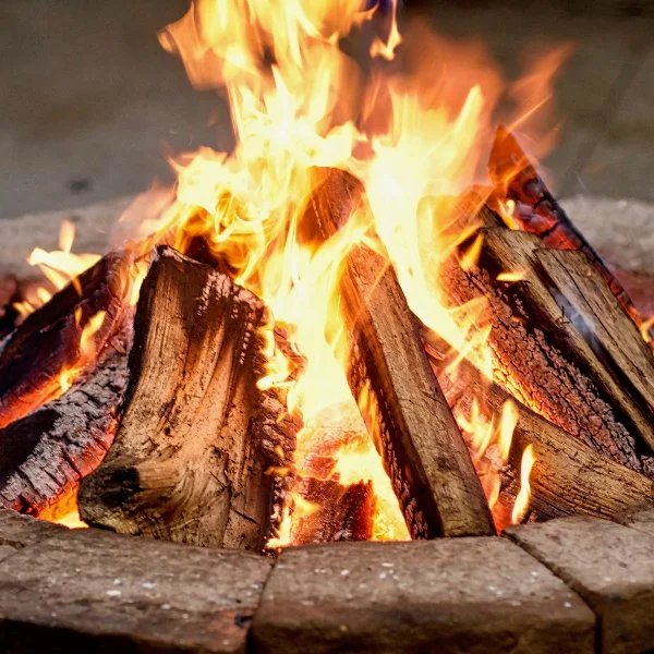 Wood-burning stone fire pit at a home in Manheim, PA.